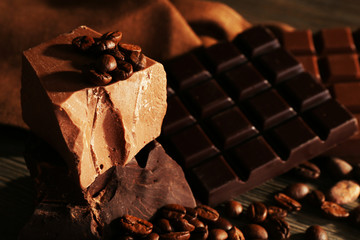 Still life with set of chocolate with coffee grains, closeup