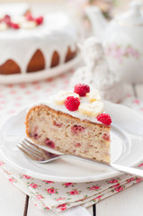 Banana Cake with Sugar Glaze Topped with Raspberries and Banana