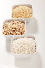 Row rice in three variation - white, integral and yellow