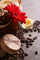 Composition of spa treatment, flowers and coffee beans