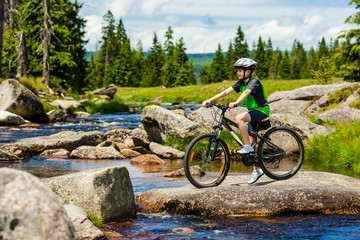 Healthy lifestyle - teenage boy biking