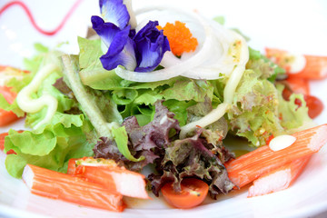 salad mix with fresh vegetable and crab stick