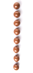 Chocolate balls with over white background