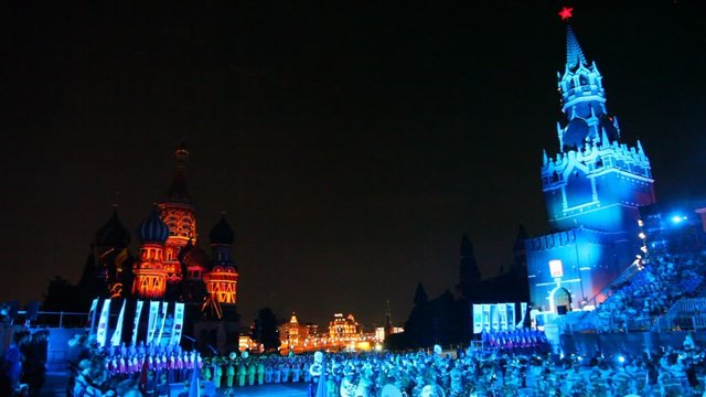MOSCOW - AUG 31: Spectators watching military orchestra parade at Military Music Festival Spasskaya Tower, on Aug 31, 2011 in Moscow, Russia.