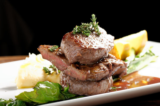 Venison meat steak with potato puree and vegetable