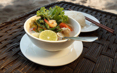 Lemongrass seafood soup with steamed rice
