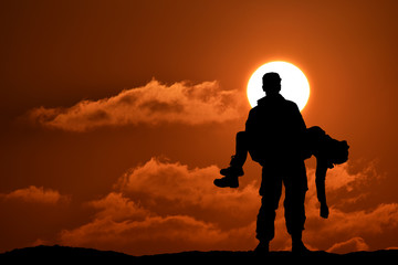 silhouette of a soldier officer man holding on hands girl woman