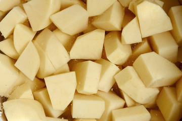 The diced potato tubers in water