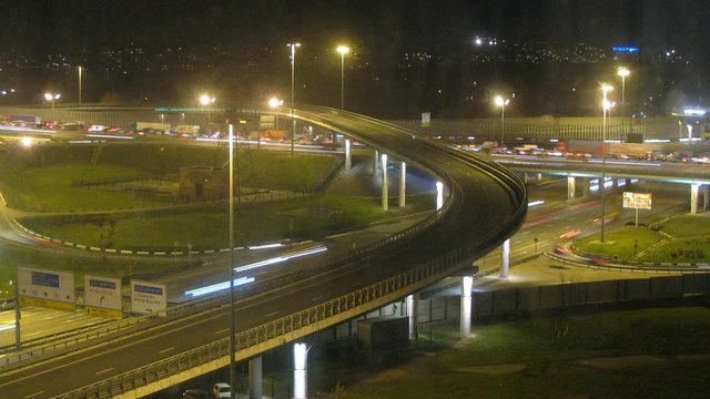 MKAD with traffic at night. Timelapse, rotating camera