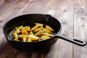 Hot fried potatoes in a pan