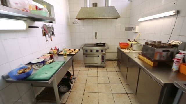 Kitchen of the restaurant with different kitchenware