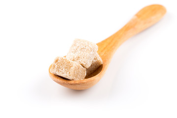 Fototapeta na wymiar brown sugar in a wooden spoon