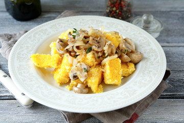 Italian polenta with fried mushrooms