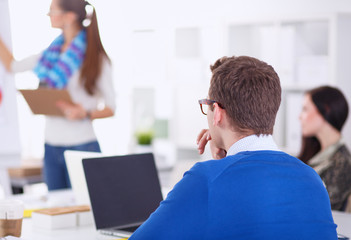 Young business people working at office on new project