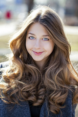Fototapeta premium Portrait close up of young beautiful girl