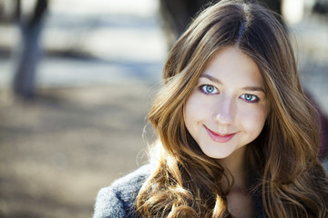 Obraz premium Portrait close up of young beautiful girl