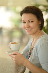 Woman drinking a coffee