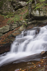 landscape with mountains trees and a river