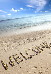 text on sand - welcome
