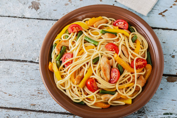 spaghetti with chicken fillet pepper and tomato