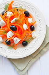 Carrot pasta salad with feta, olivs and dill