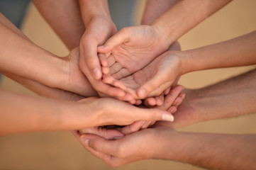 Hands of a family together 