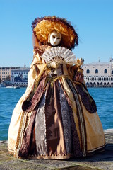 Carnival of Venice, Italy. Woman in costume and mask