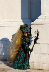 Carnival of Venice, Italy. Woman in costume and mask