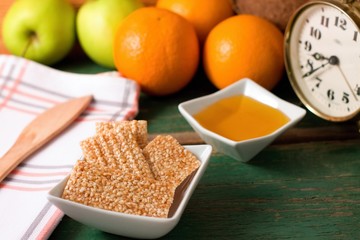 Breakfast with sesame wafers and fruit