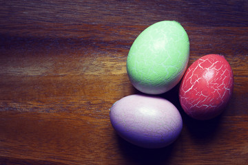 Easter eggs. Easter still life and wooden background.