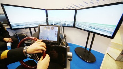 Three screens of boat simulator at VI International Exhibition