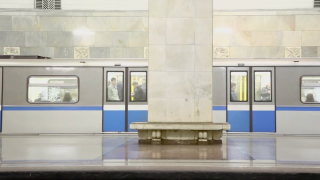 Doors Close And Train Ride Away From Empty Platform Of Metro Station