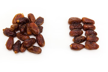 Medjool dates isolated on a white background.
