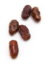 Medjool dates isolated on a white background.