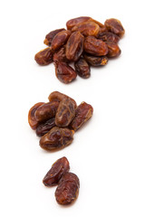 Medjool dates isolated on a white background.