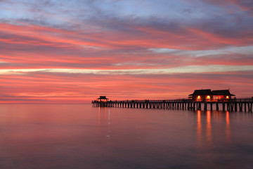 Fototapeta na wymiar Naples Pier at sunset, Gulf of Mexico, USA