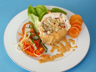 chicken with pasta filling and curry sauce