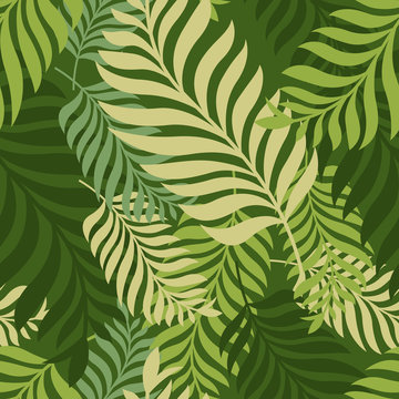 Green palm tree leaves. Vector seamless pattern. Nature organic