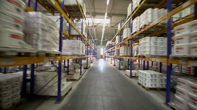 Motion through aisle in warehouse of Caparol factory