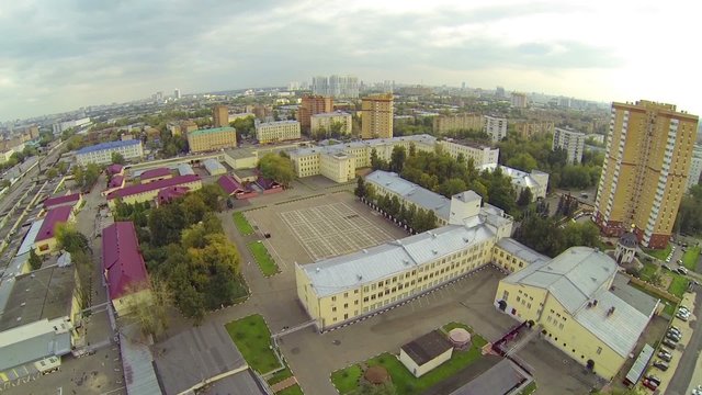 Army garrison with big plateau in front of barracks, aerial view