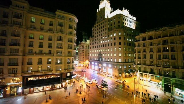 Citizen walk by Gran Via street near Telefonica building