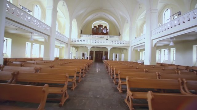 Rows of benches and organ in Evangelical Lutheran Cathedral