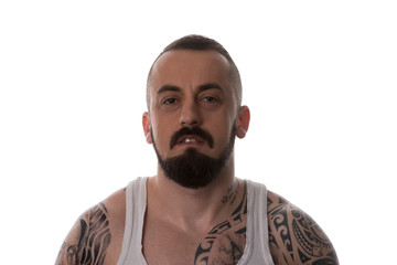 Man With Tattoo And Beard On White Background