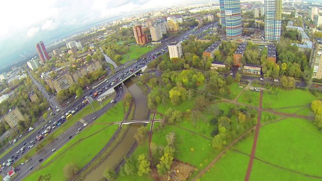 Day view: city panorama with river and bridge, aerial view