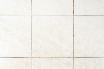 Dirty tile on bathroom floor