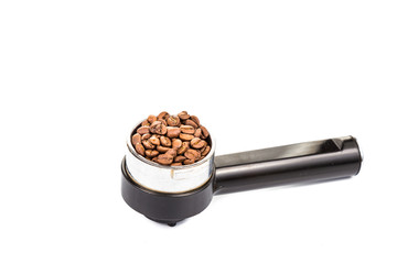 Coffee portafilter fully filled with coffee beans