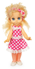 Old plastic doll in pink dress