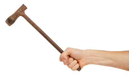 Old metal pickaxe in male hand