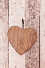 A wooden heart on a wall