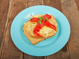 Sandwich with tomatoes on a plate